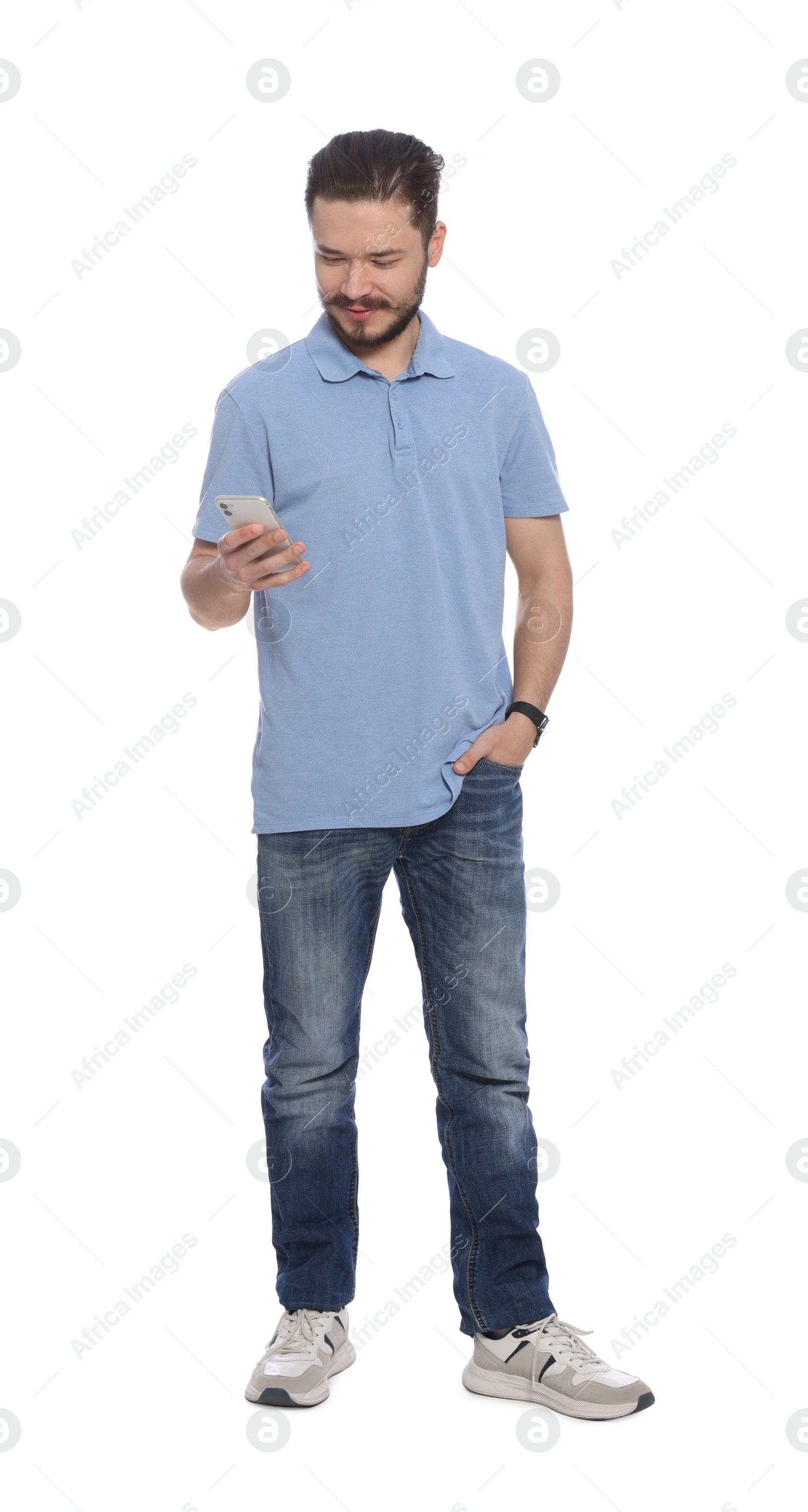 Photo of Handsome man using smartphone on white background