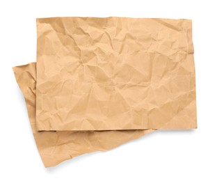 Photo of Sheets of crumpled brown paper on white background, top view