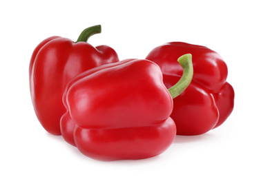 Ripe red bell peppers isolated on white