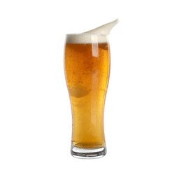 Beer splashing out of glass on white background