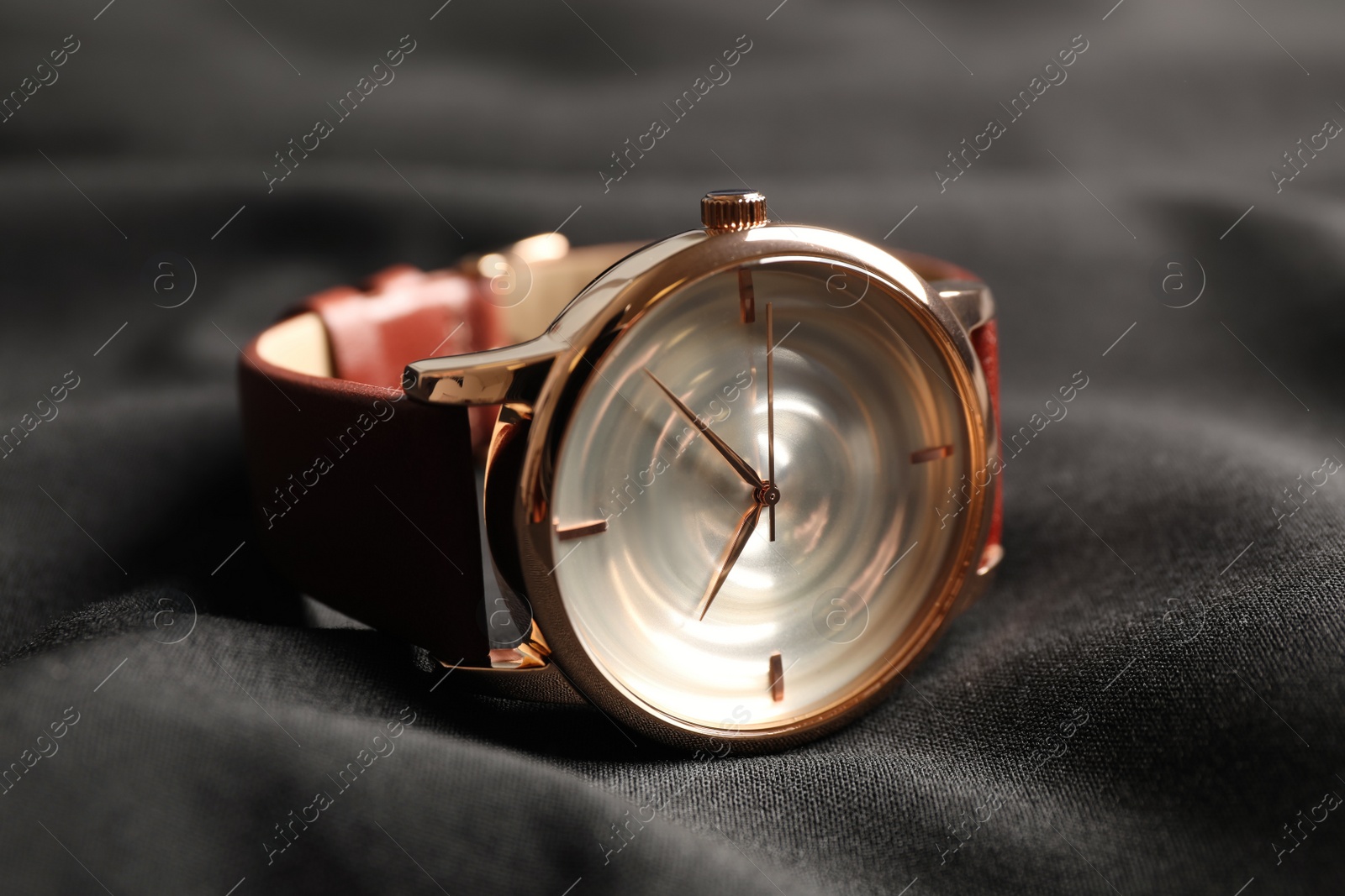 Photo of Luxury wrist watch on black background, closeup