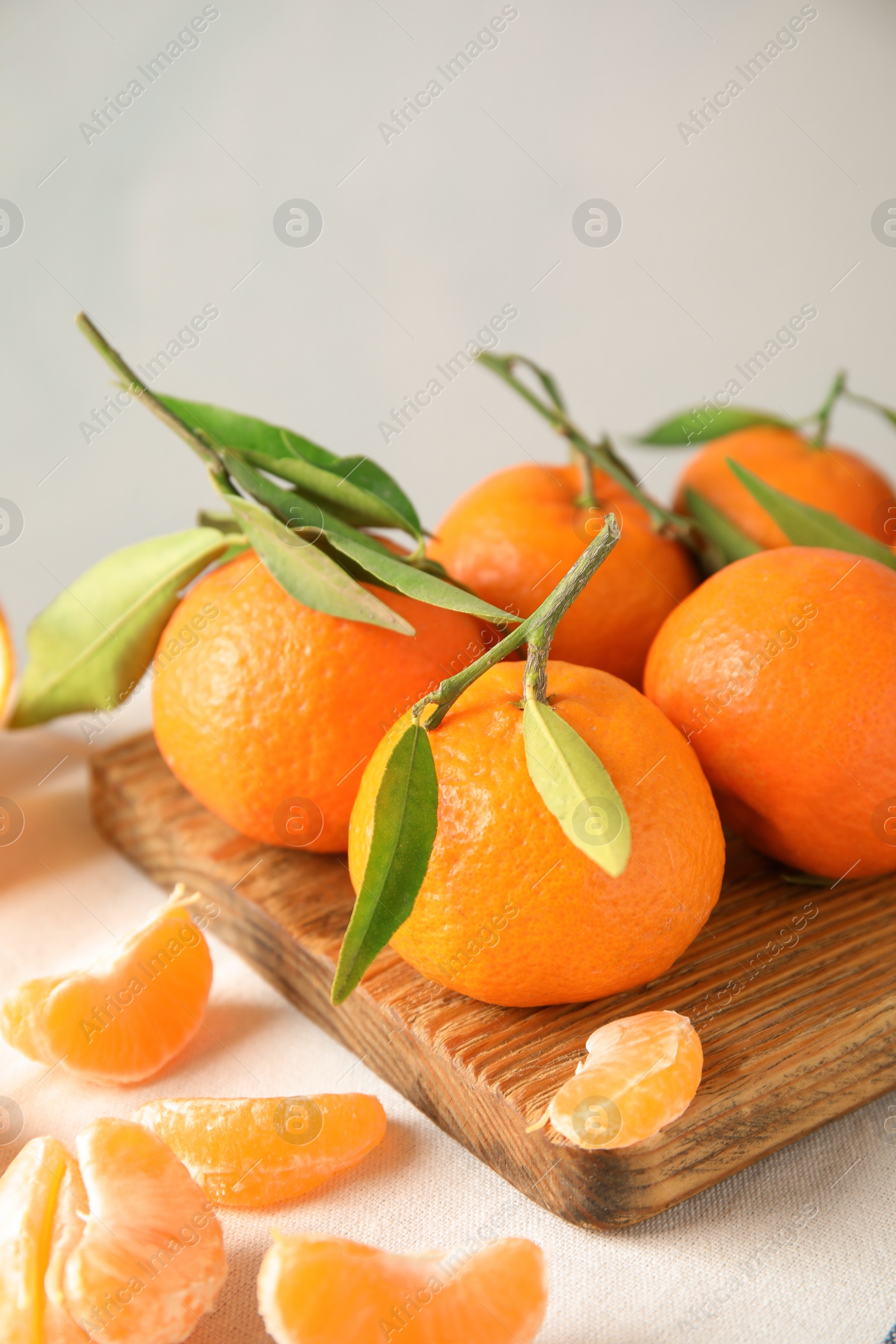 Photo of Ripe tangerines on table. Tasty citrus fruit