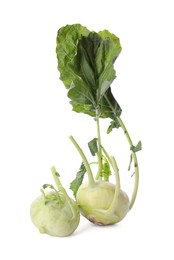 Photo of Whole ripe kohlrabies with leaves on white background