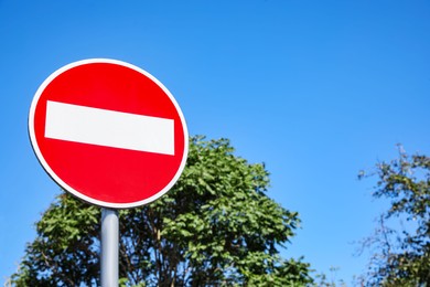 Photo of Traffic sign No Entry outdoors, low angle view. Space for text