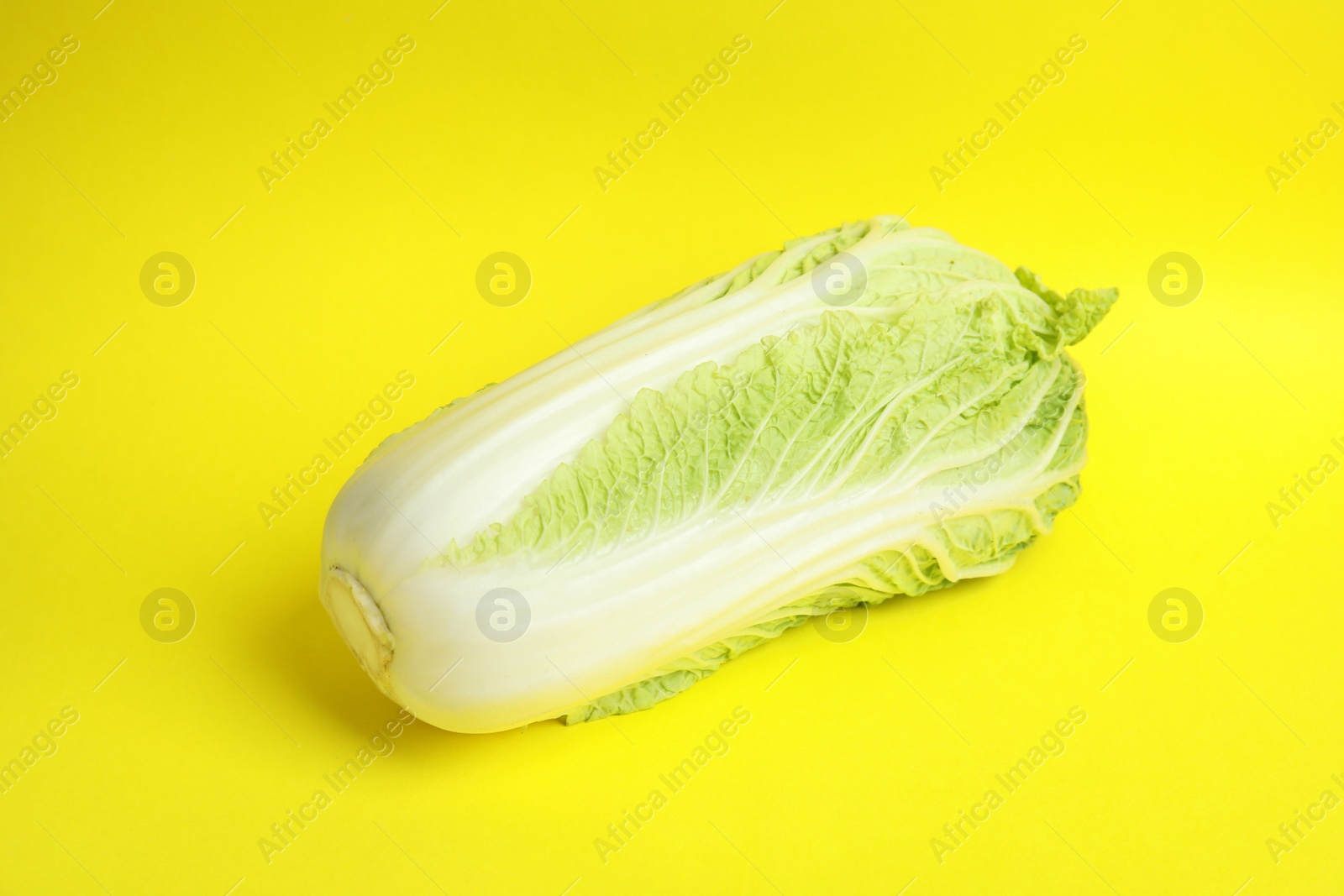 Photo of Fresh ripe cabbage on color background