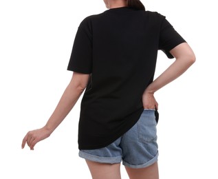 Photo of Woman in stylish black t-shirt on white background, back view