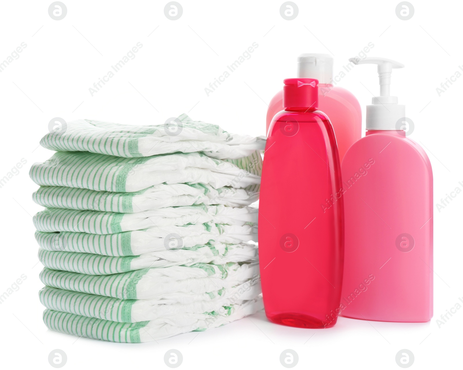 Photo of Composition with diapers and toiletries on white background. Baby accessories