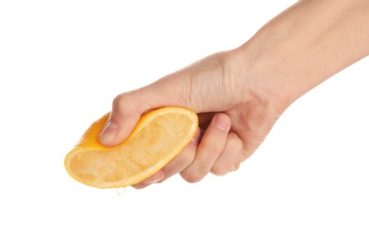 Photo of Woman squeezing fresh lemon juice isolated on white, closeup