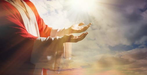 Jesus Christ reaching out his hands and praying at sunset, banner design