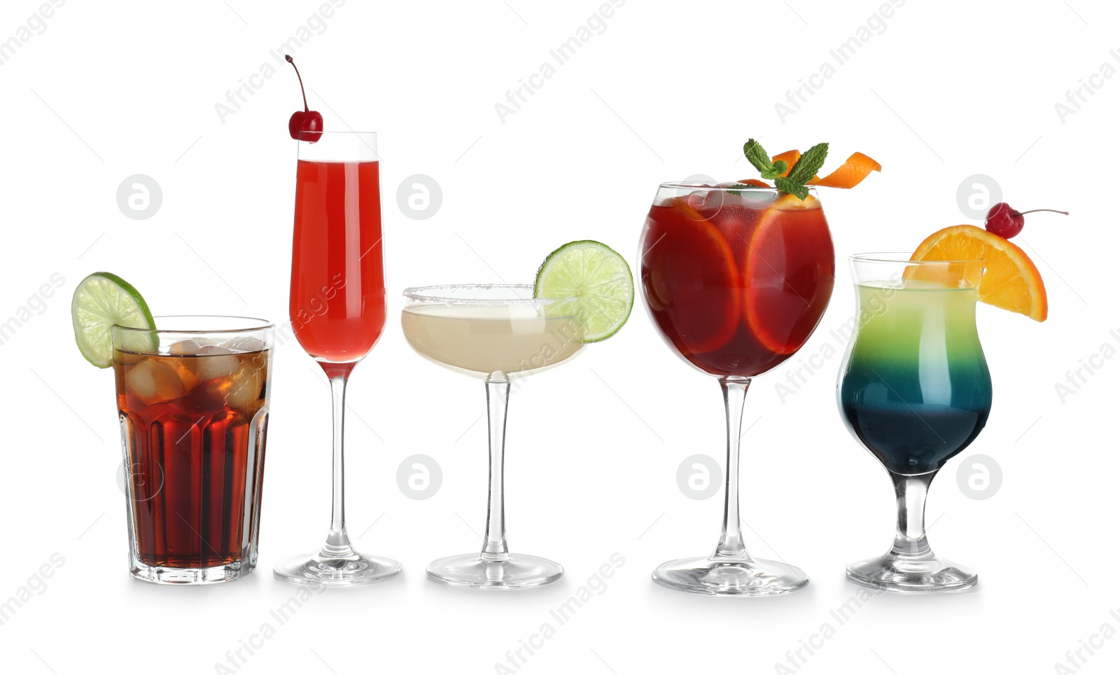 Photo of Glasses of traditional alcoholic cocktails on white background