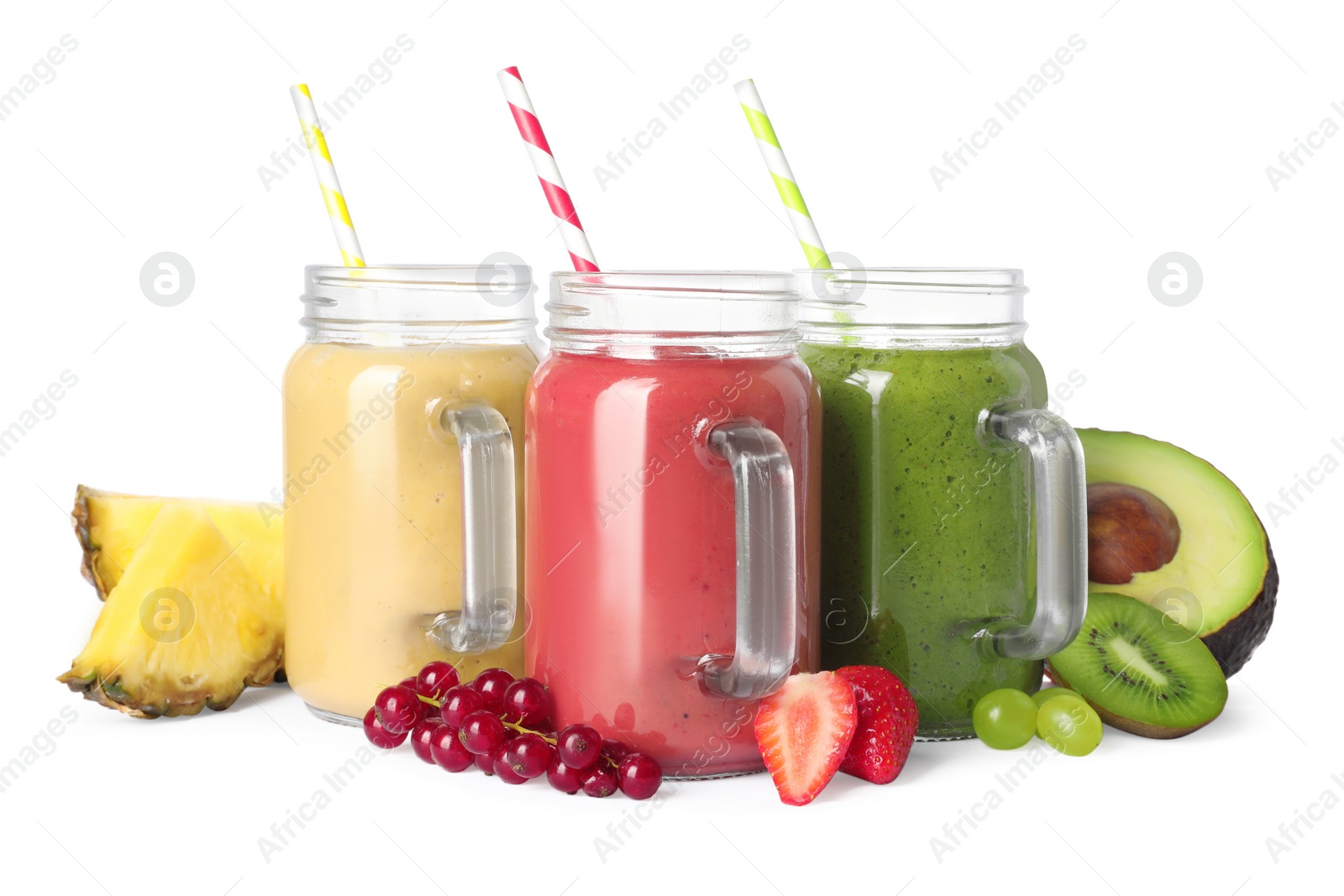 Photo of Different tasty smoothies in mason jars isolated on white