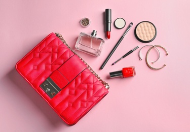 Photo of Flat lay composition with decorative cosmetics on color background