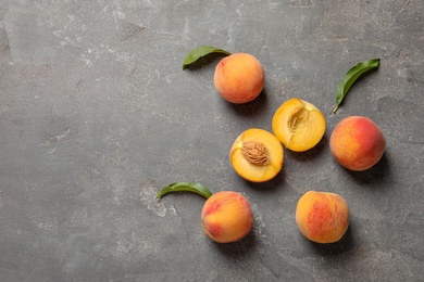 Fresh sweet peaches on table, top view