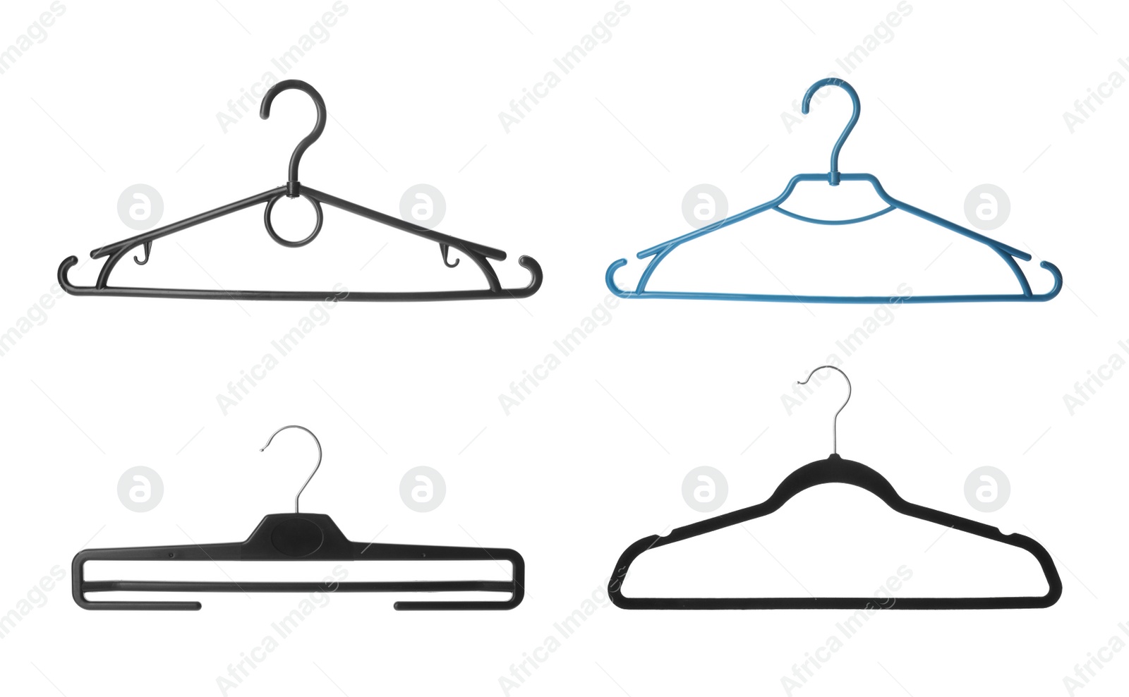 Image of Set with different empty hangers on white background