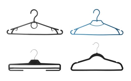 Set with different empty hangers on white background