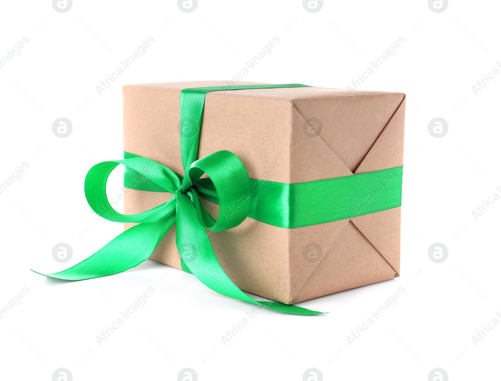 Photo of Christmas gift box decorated with ribbon bow on white background