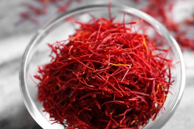 Dried saffron in glass bowl, closeup view