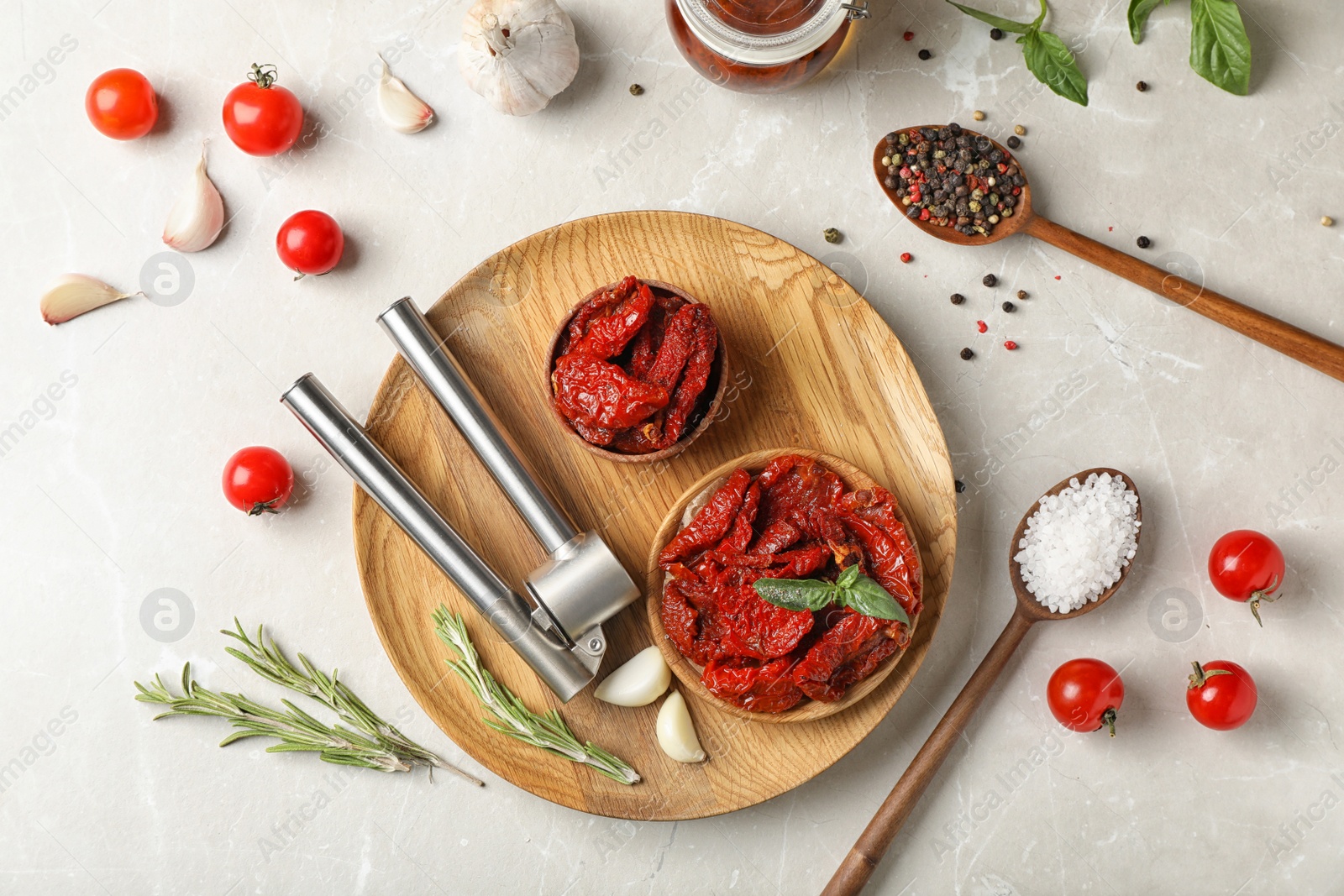 Photo of Flat lay composition with dried tomatoes on table