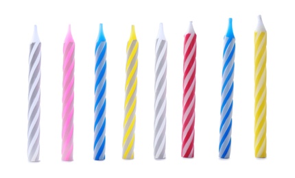 Set of colorful striped birthday candles isolated on white