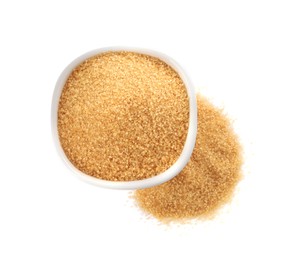 Bowl and granulated brown sugar on white background, top view