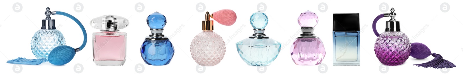 Image of Set with different bottles of perfume on white background, banner design 