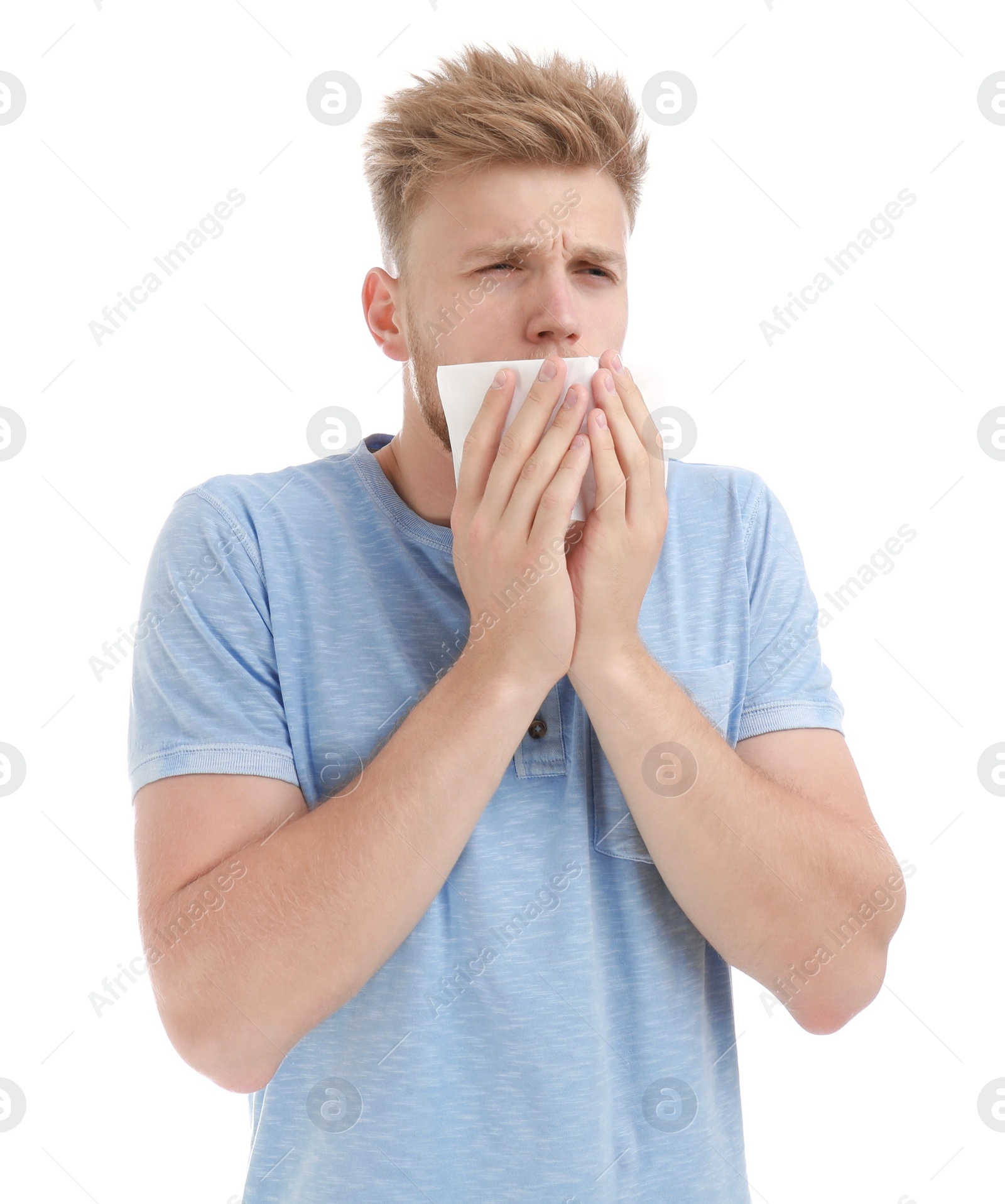 Photo of Young man suffering from allergy on white background