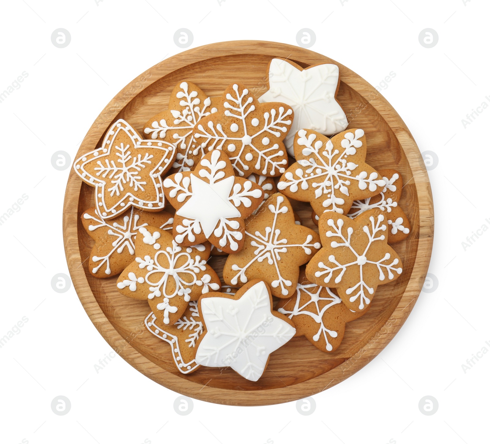 Photo of Tasty star shaped Christmas cookies with icing isolated on white, top view