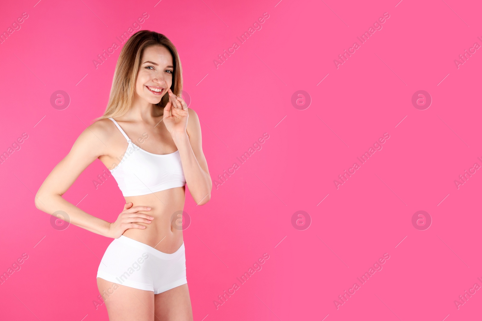 Photo of Young slim woman on color background, space for text. Perfect body