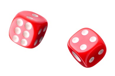 Image of Two red dice in air on white background