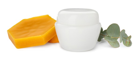 Photo of Cream, eucalyptus and natural beeswax on white background