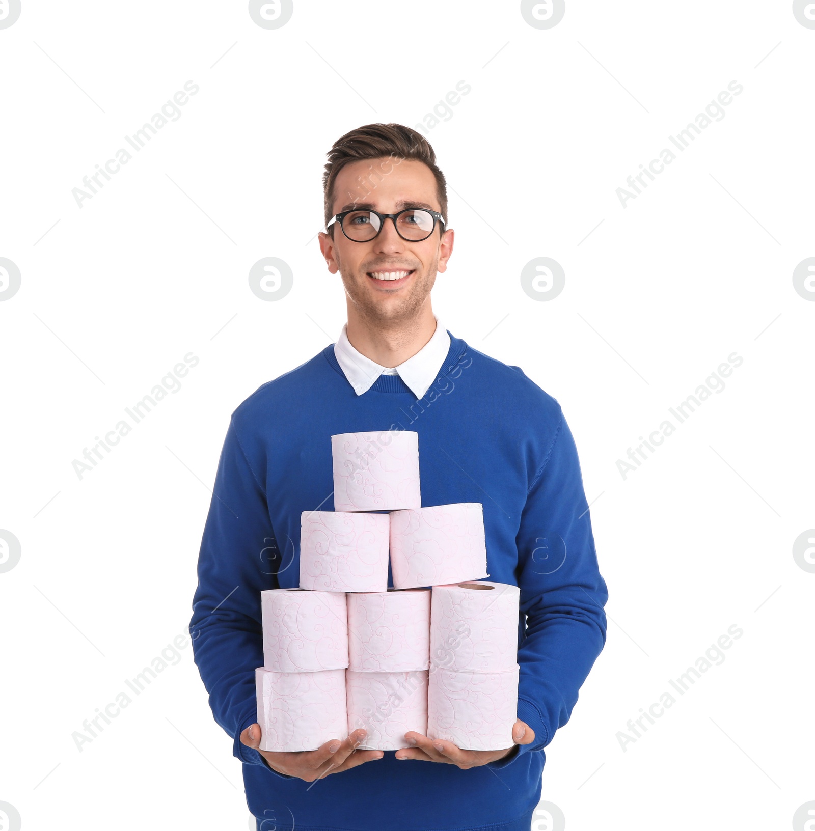 Photo of Young man holding toilet paper rolls on white background