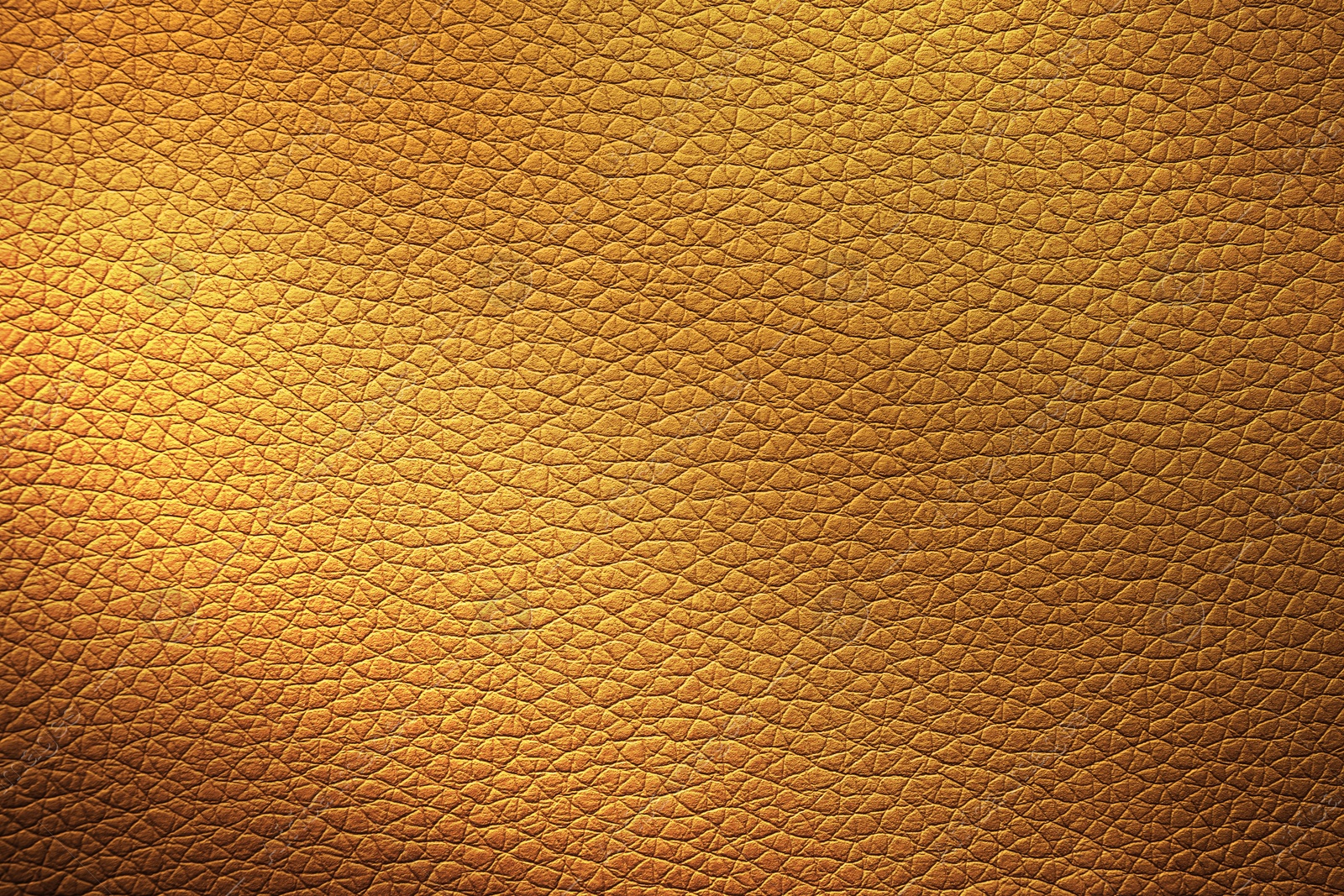 Image of Golden textured surface as background, closeup view