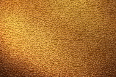 Image of Golden textured surface as background, closeup view