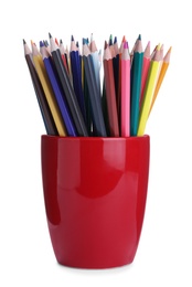 Photo of Colorful pencils in red cup on white background