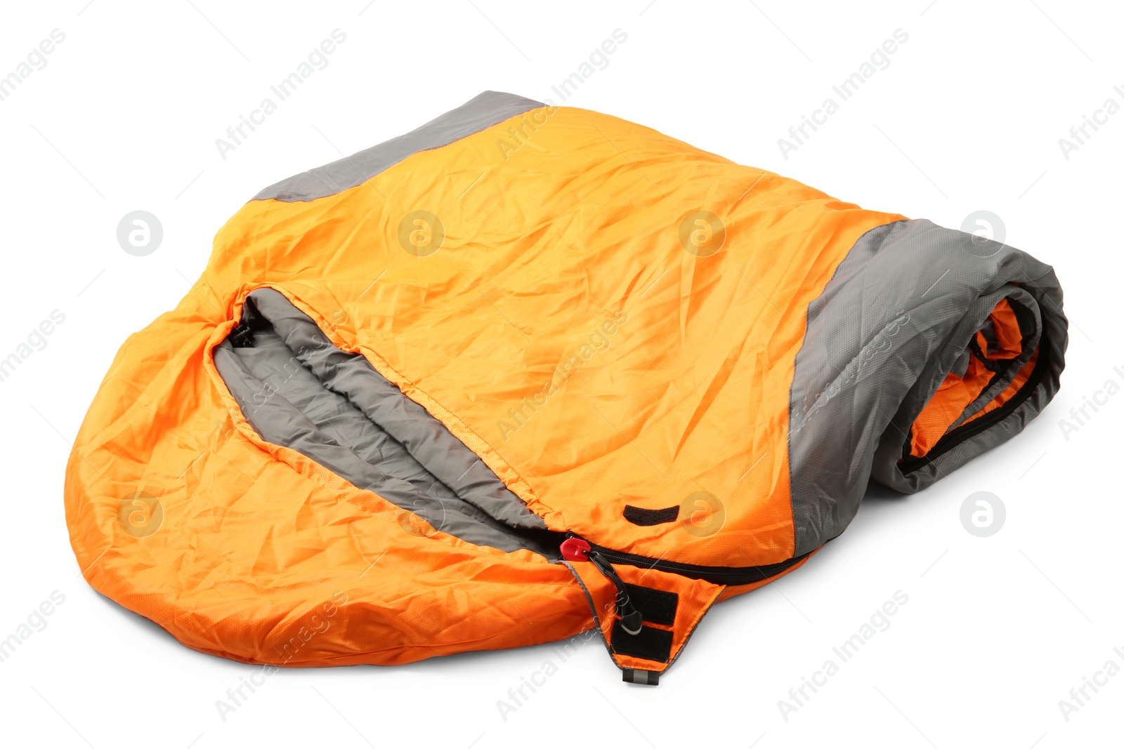 Photo of Bright sleeping bag on white background. Camping equipment