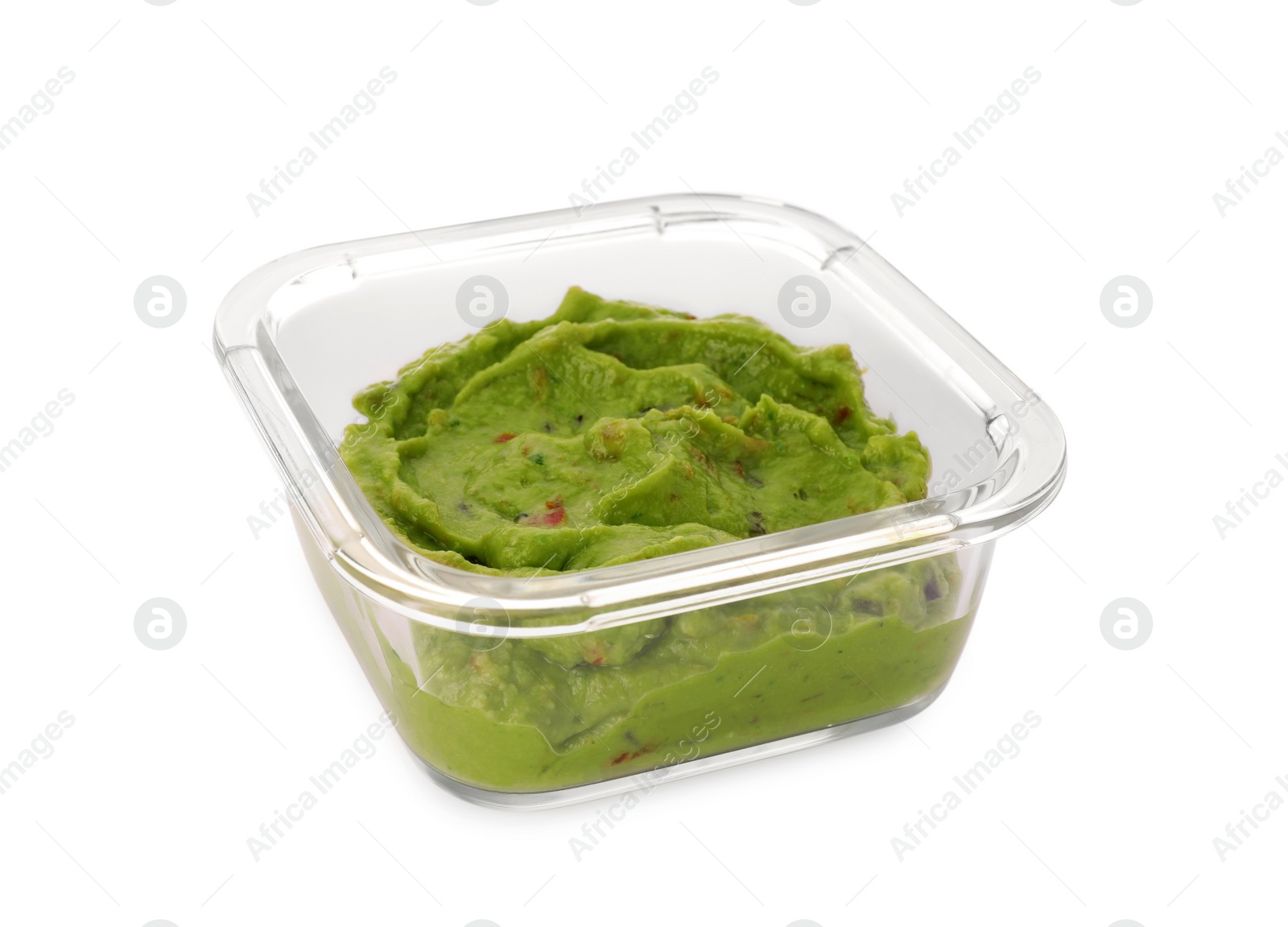 Photo of Bowl of delicious guacamole isolated on white