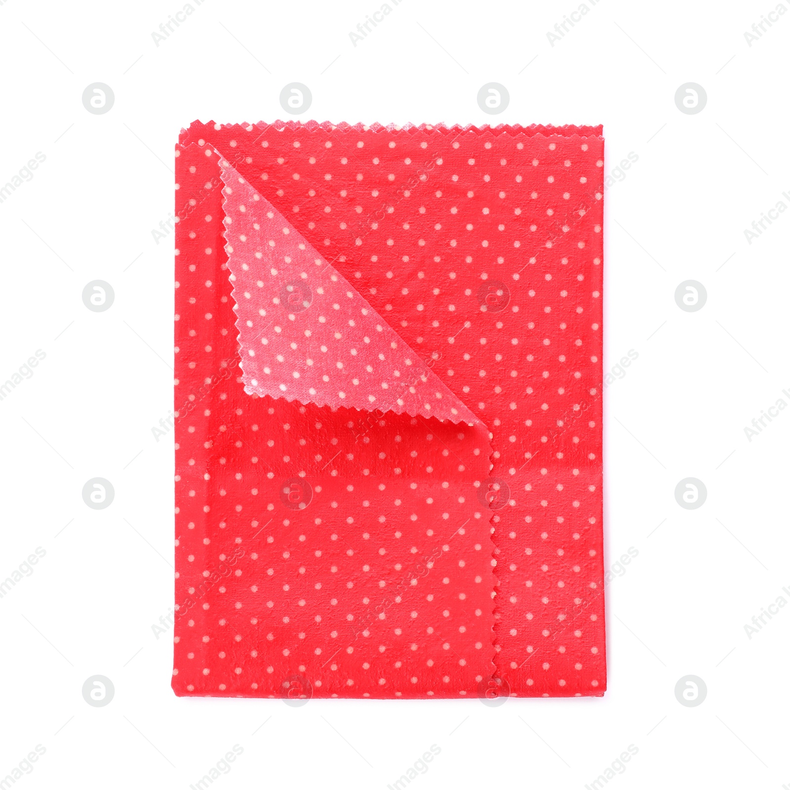 Photo of Red reusable beeswax food wrap on white background, top view