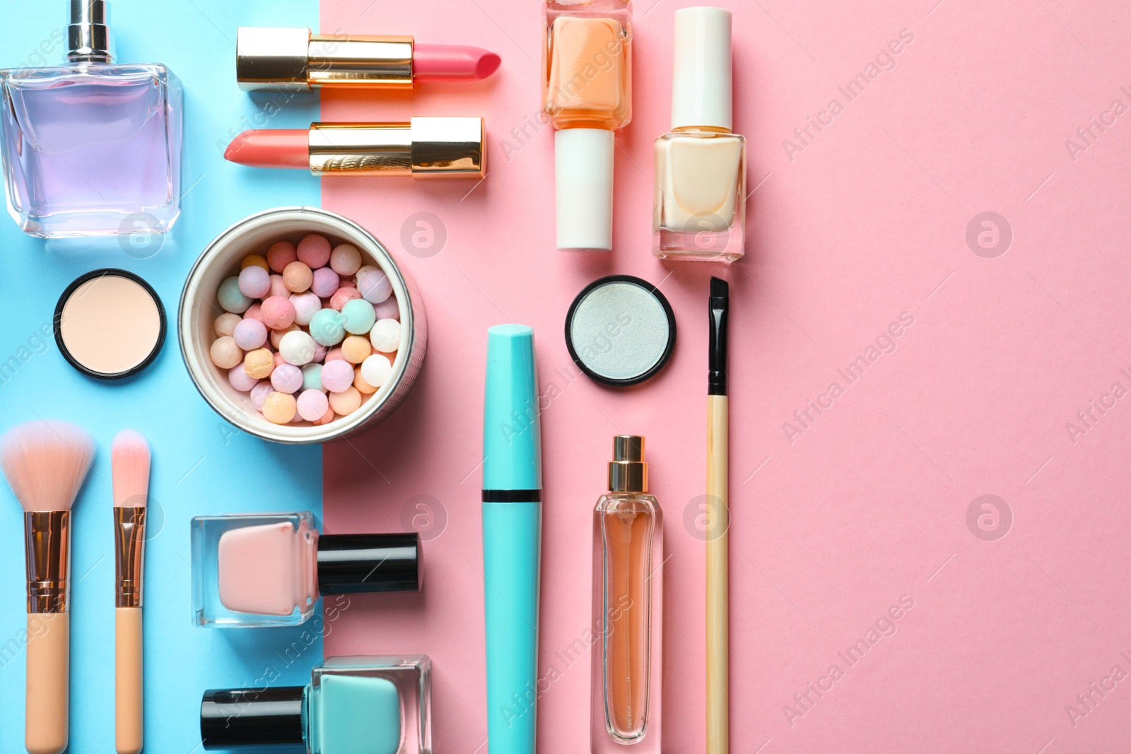 Photo of Flat lay composition with decorative cosmetics on color background