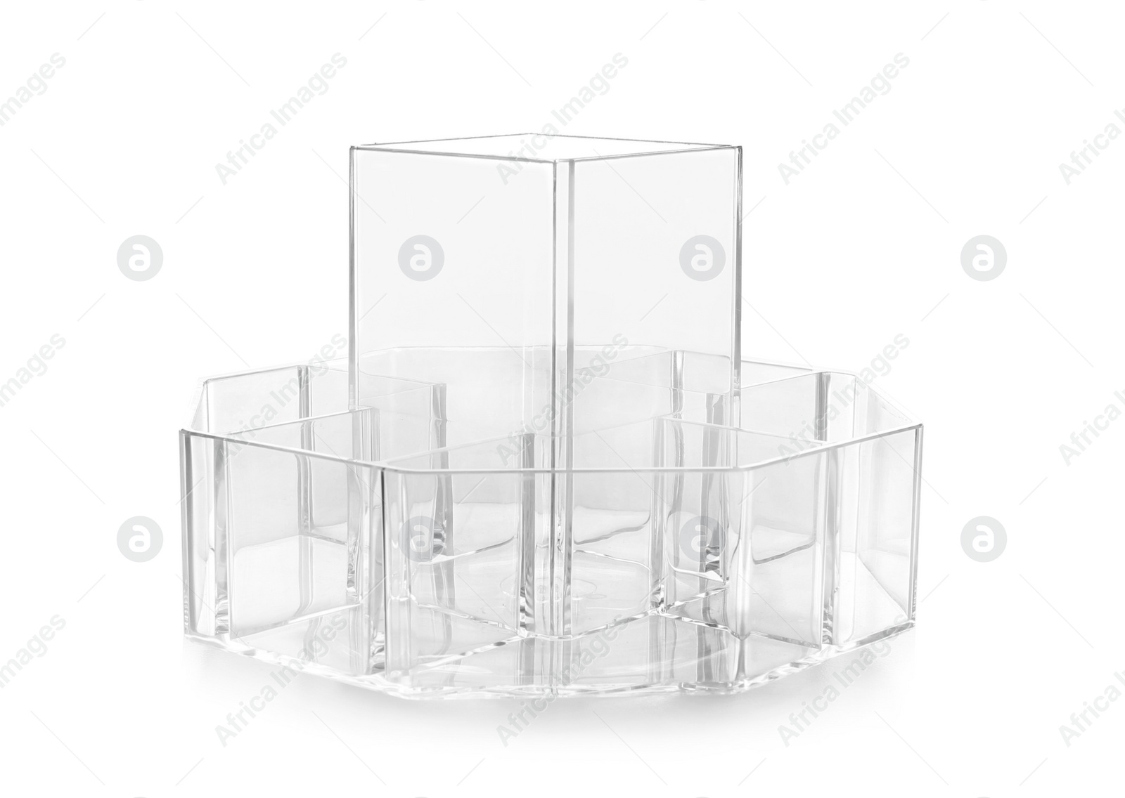 Photo of Empty transparent organizer for makeup cosmetic products on white background