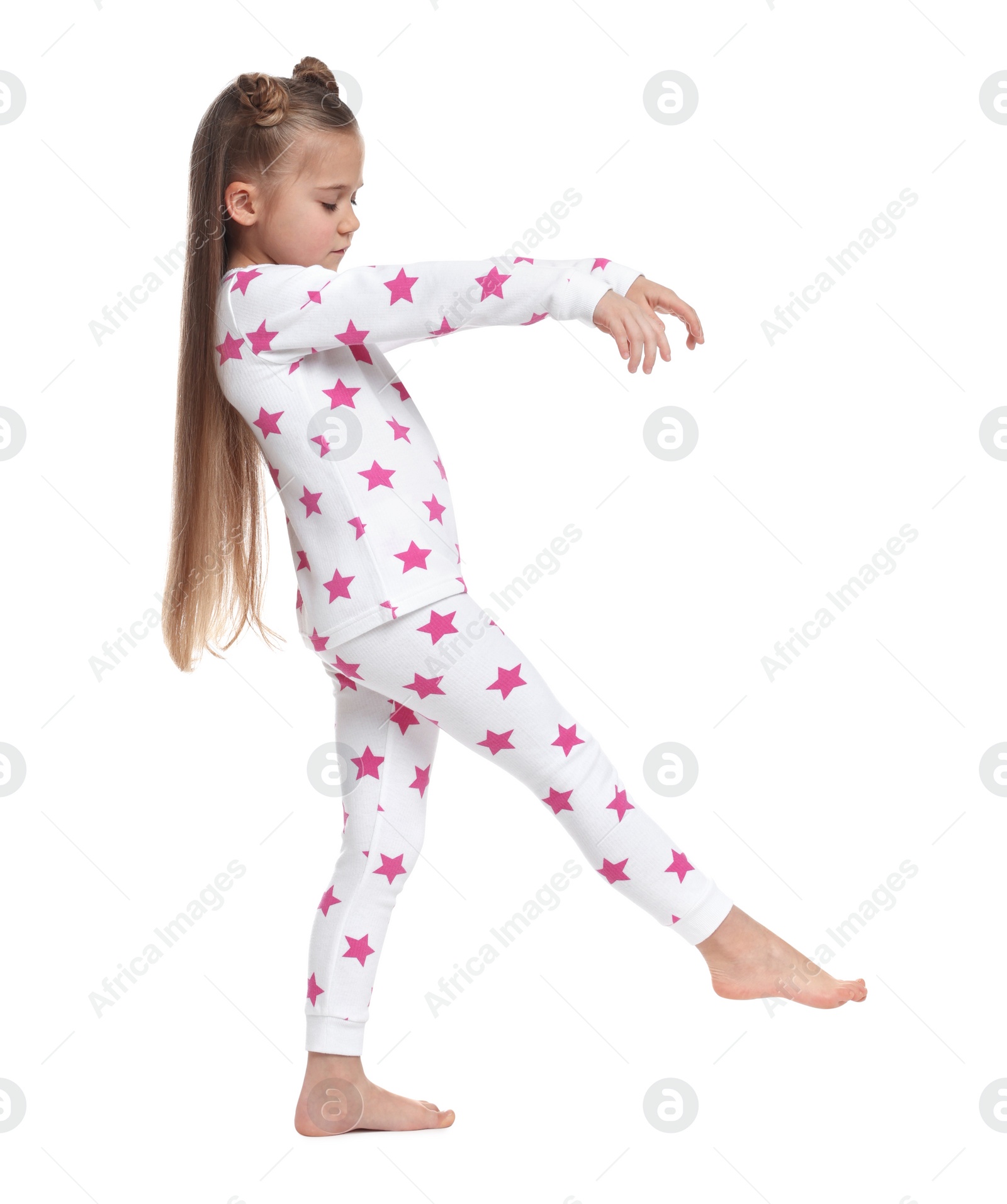 Photo of Girl in pajamas sleepwalking on white background