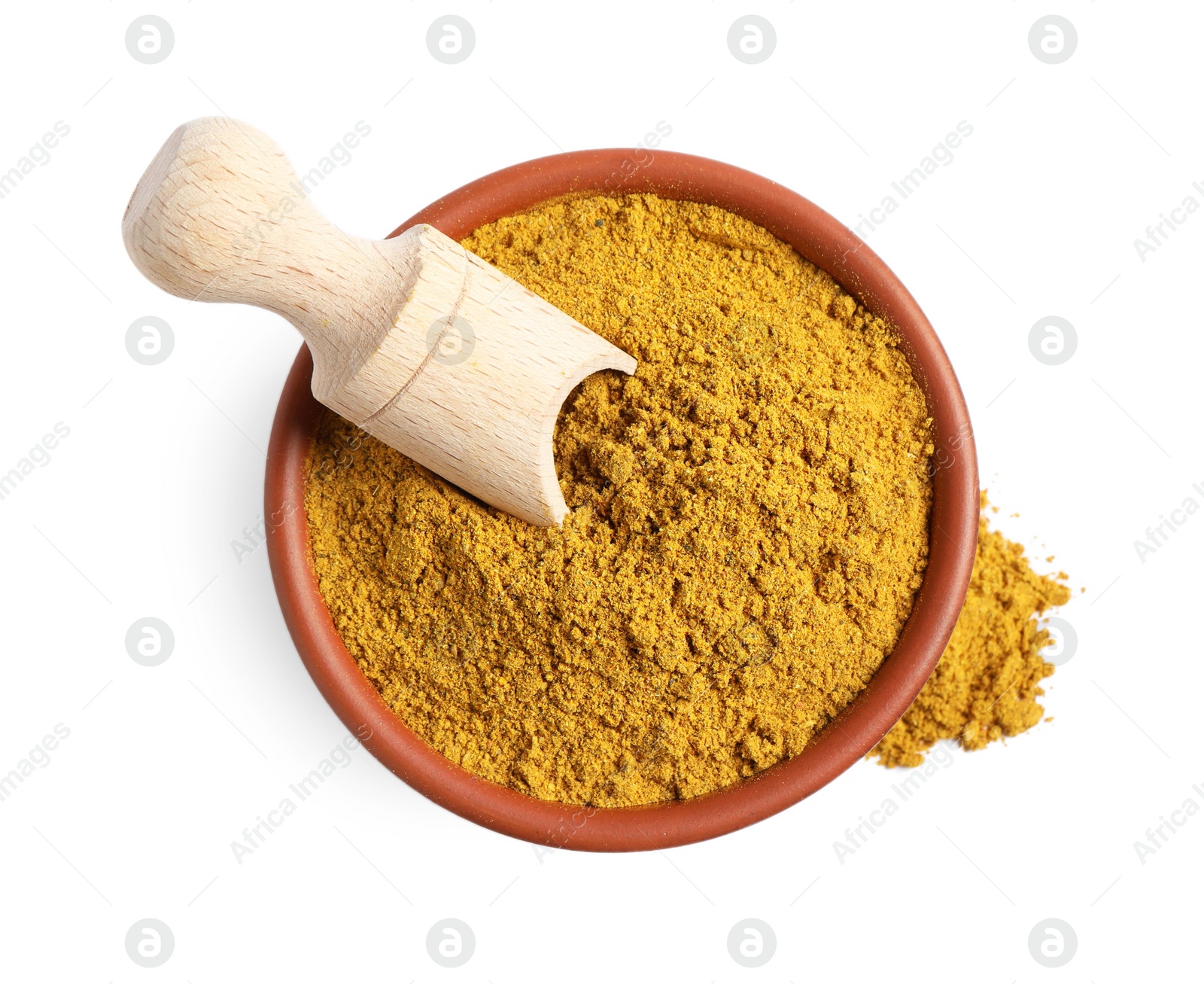 Photo of Curry powder in bowl and scoop isolated on white, top view