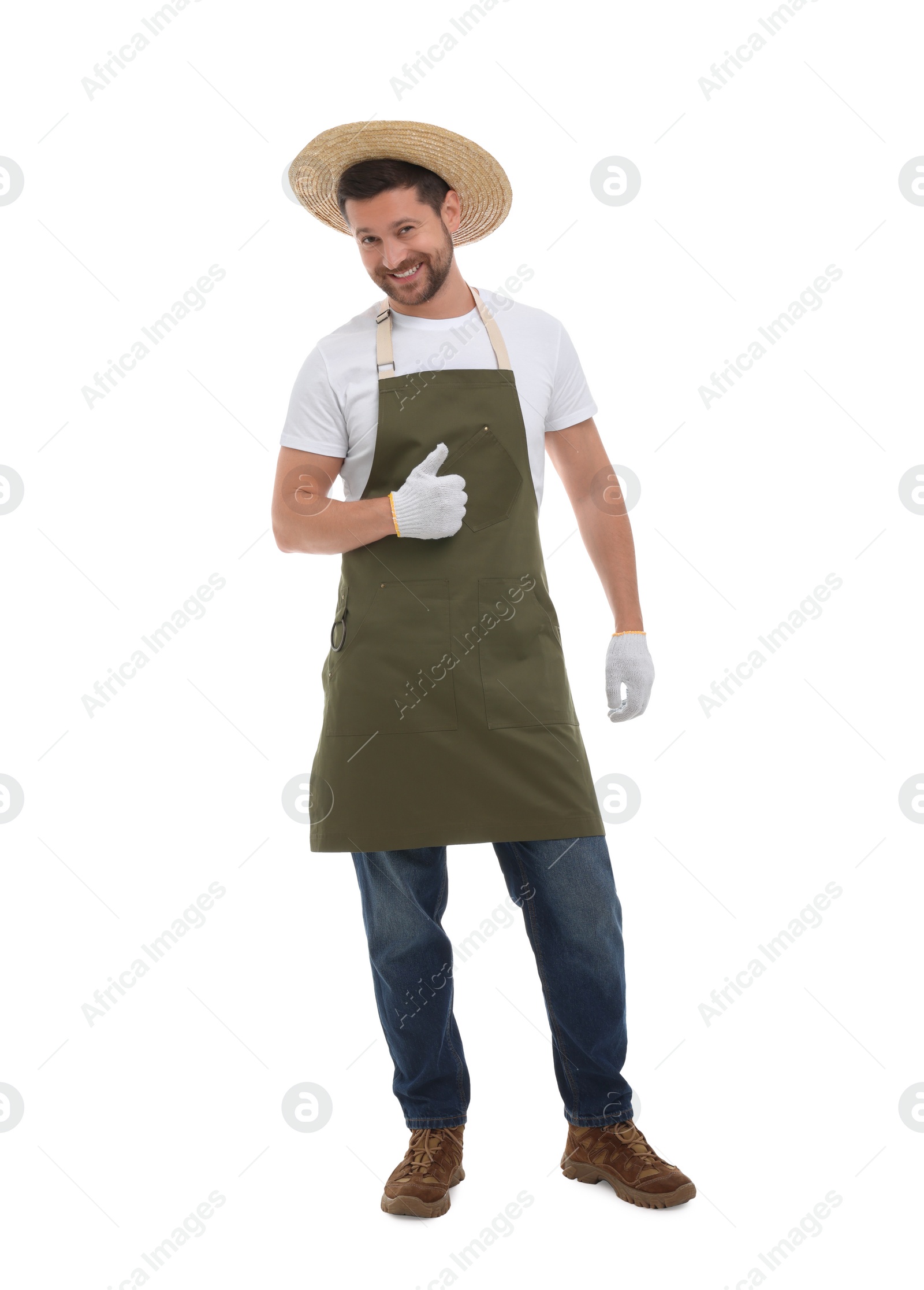 Photo of Smiling farmer showing thumb up on white background. Harvesting season