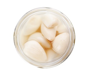 Photo of Glass jar with preserved garlic on white background, top view