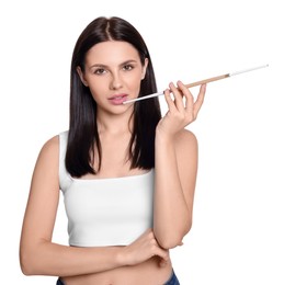 Woman using long cigarette holder for smoking isolated on white