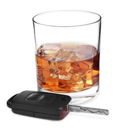 Photo of Glass of alcohol and car key on white background. Drunk driving concept