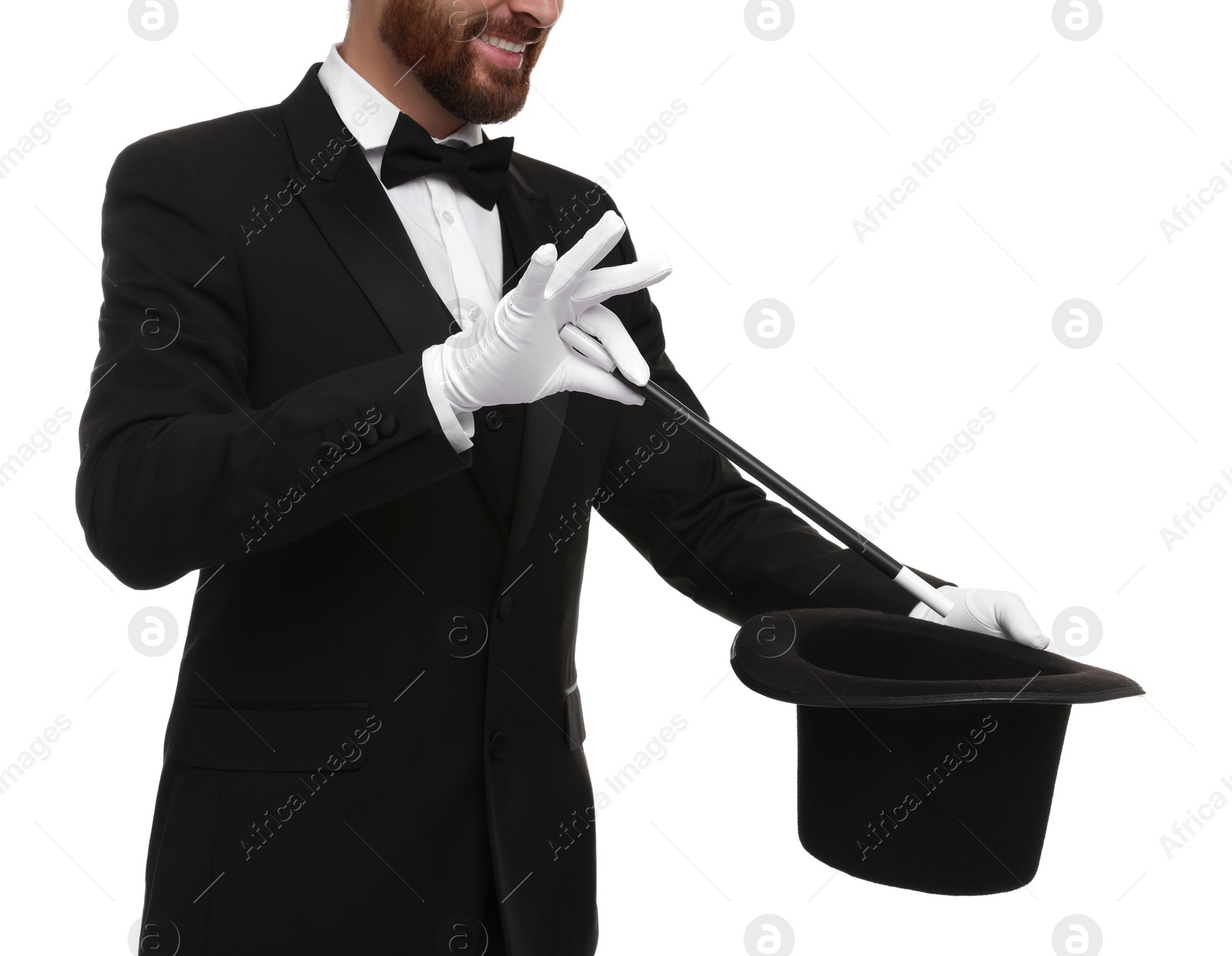 Photo of Magician showing magic trick with top hat on white background, closeup