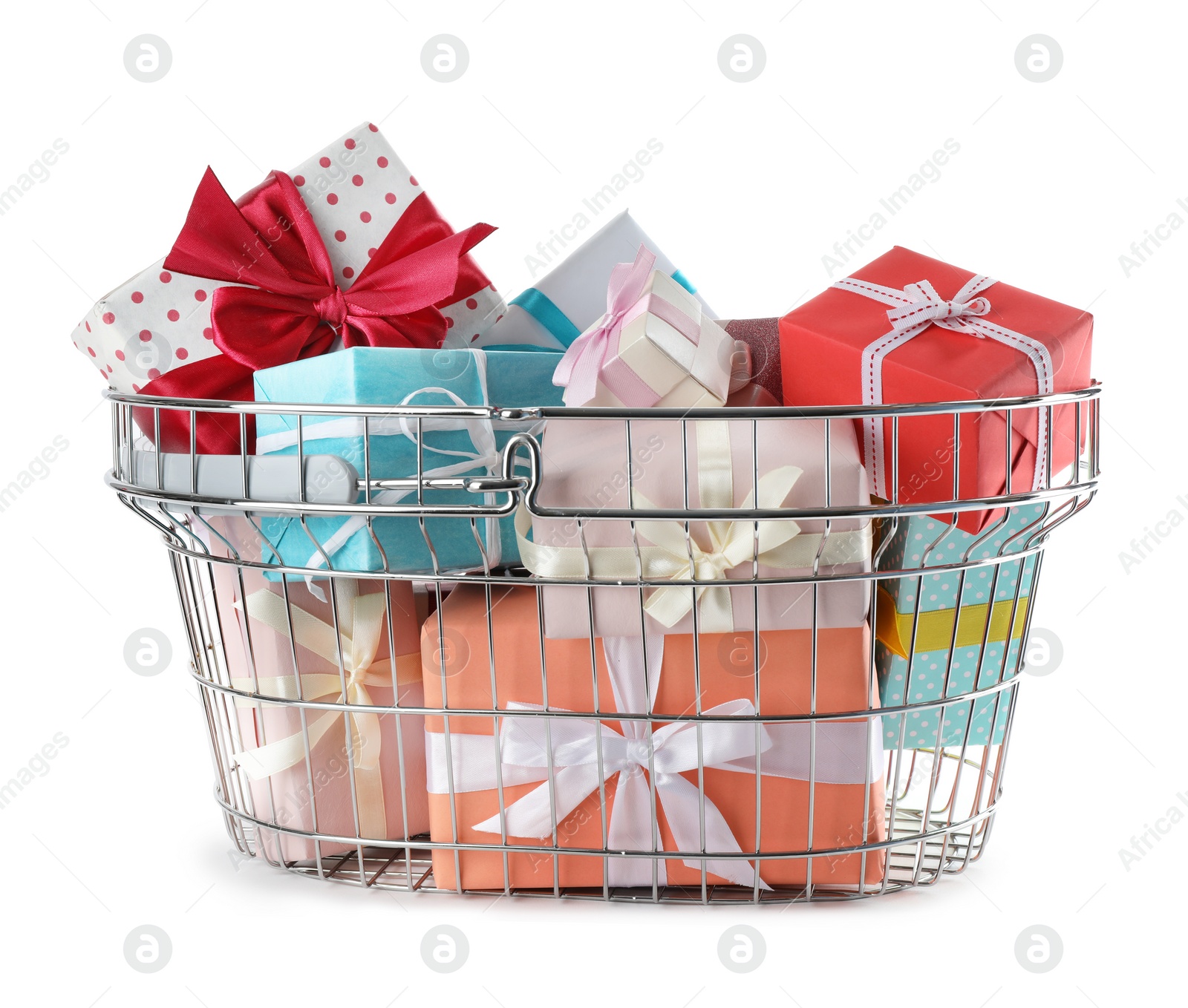 Photo of Shopping basket full of gift boxes on white background