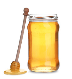 Jar of organic honey and dipper isolated on white