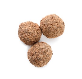 Delicious chocolate truffles on white background, top view