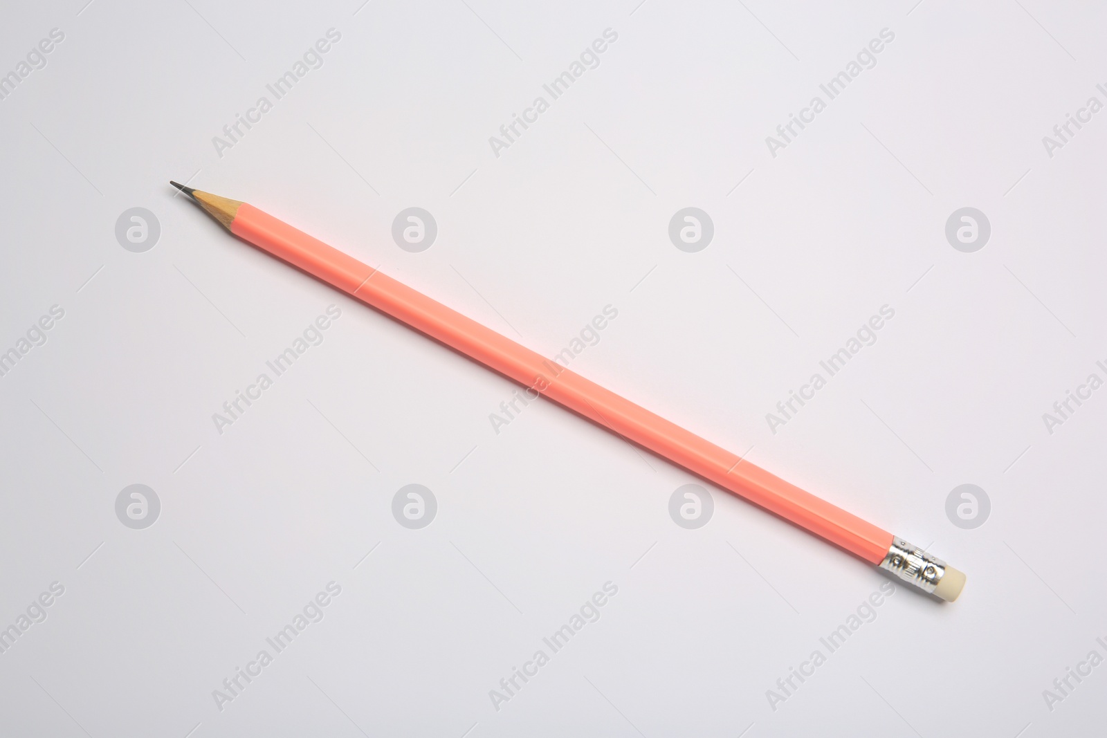 Photo of One new graphite pencil on white background, top view